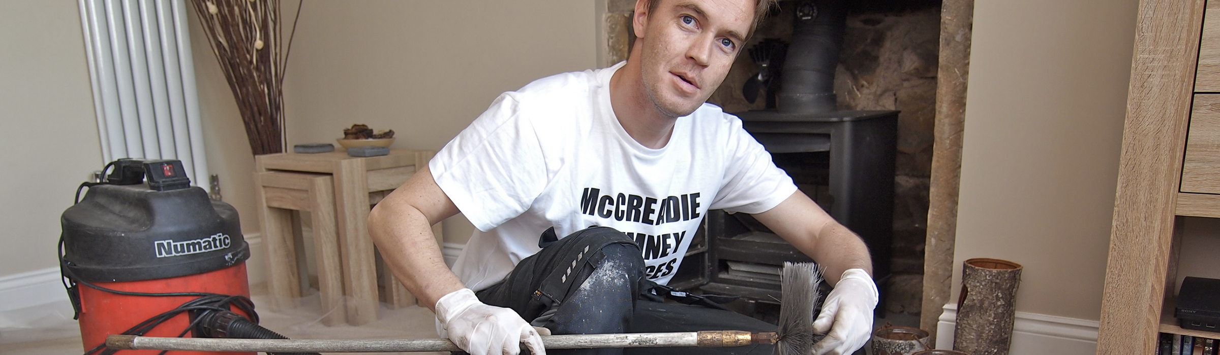 Man cleaning chimney